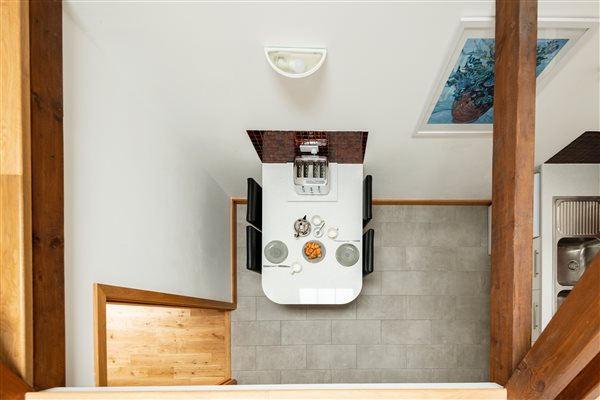 View of the kitchen from above with breakfast bar